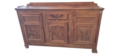 a wooden cabinet with drawers and drawers on it