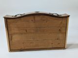 an old wooden box with a handle on a white background