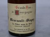 a bottle of wine that is sitting on a table