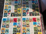 a lot of books that are on a table