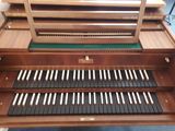 a very large organ with many keys on it