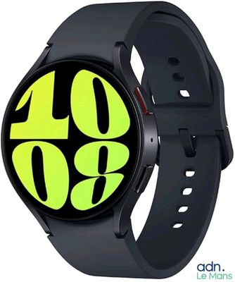 an image of a black and yellow smart watch on a white background