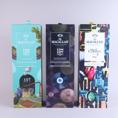 three boxes of macallan coffee sit side by side