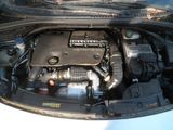 a picture of a car engine with its hood open