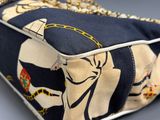 an image of a purse with an elephant design on it