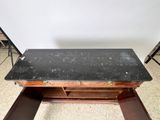 an image of a desk with a marble top and drawers