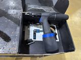 a tool that is sitting in a box on the floor