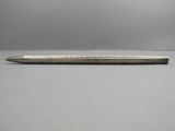 an image of a pen that is laying on a table
