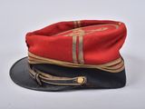 uniform of a soldier ' s cap with a leather brimle