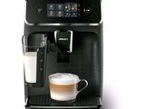 an image of a coffee machine with a glass of milk