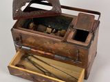 a small wooden box with a mirror on top of it