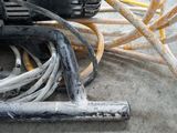 a bunch of wires that are laying on the ground