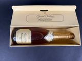 an open box with a bottle of wine inside of it