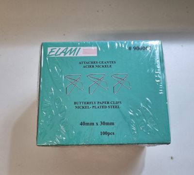 an image of a box of scissors sitting on top of a table