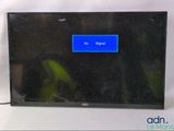 a tv that has a blue screen on top of it