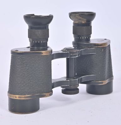 a pair of binoculars that are sitting on a table
