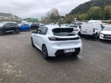 a white car parked in a parking lot next to other cars