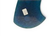a blue and green vase with a tag on it