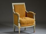 an image of a chair with a yellow upholstered seat