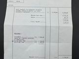 a picture of a receipt with a price tag on it