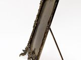 a picture of a mirror on a stand on a white background