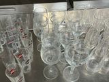 many empty wine glasses on the table ready to be filled