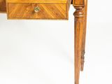 a wooden desk with a drawer underneath it