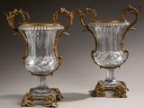 pair of antique glass vases with gold accents on stands
