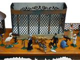 many figurines that are sitting on a wooden table