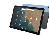a tablet computer sitting on top of a table next to another tablet