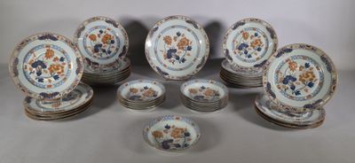 a lot of plates that are sitting on a table