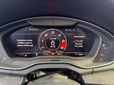 the dashboard of a car with a digital display on it
