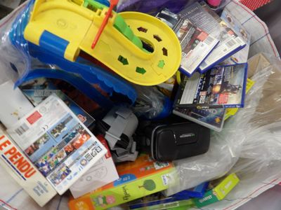 a plastic bag filled with toys and other items