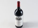 a bottle of wine that is sitting on a table