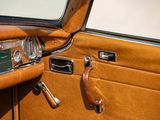 a close up of a car door with a handle on it