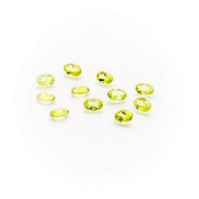 a group of yellow sapphires on a white background