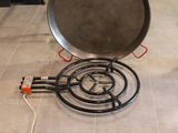 a large frying pan sitting on top of a stove