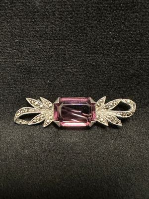 a pink tourmaline and diamond broochle