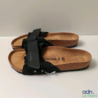 paire de sandales noires pour femme, ornées d'un nœud noir sur le côté