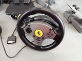 a steering wheel that is sitting on a desk