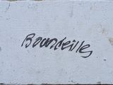 a white brick with the word boomers written on it