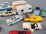 a lot of toy cars that are sitting on a table