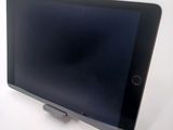 a tablet that is sitting on top of a table