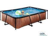 an image of a child playing in a pool with an inflatable ball