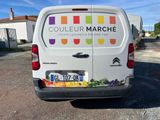 a van that is parked on the side of the road