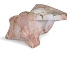 marble sculpture of a shell on a white surface with a white background