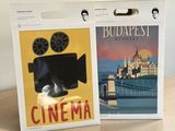 two boxes with a picture of a movie camera and a picture of a castle