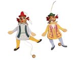 pair of handmade wooden clowns hanging on a string