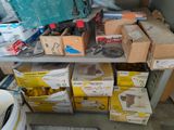 many boxes on the shelf in the garage