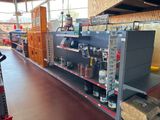 many shelves in the store that have various items on them